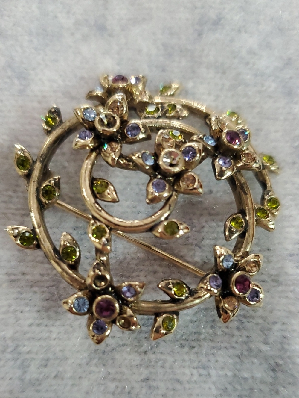 Monet Gold-Tone Floral Circle Brooch with Green, Purple, Blue Stones